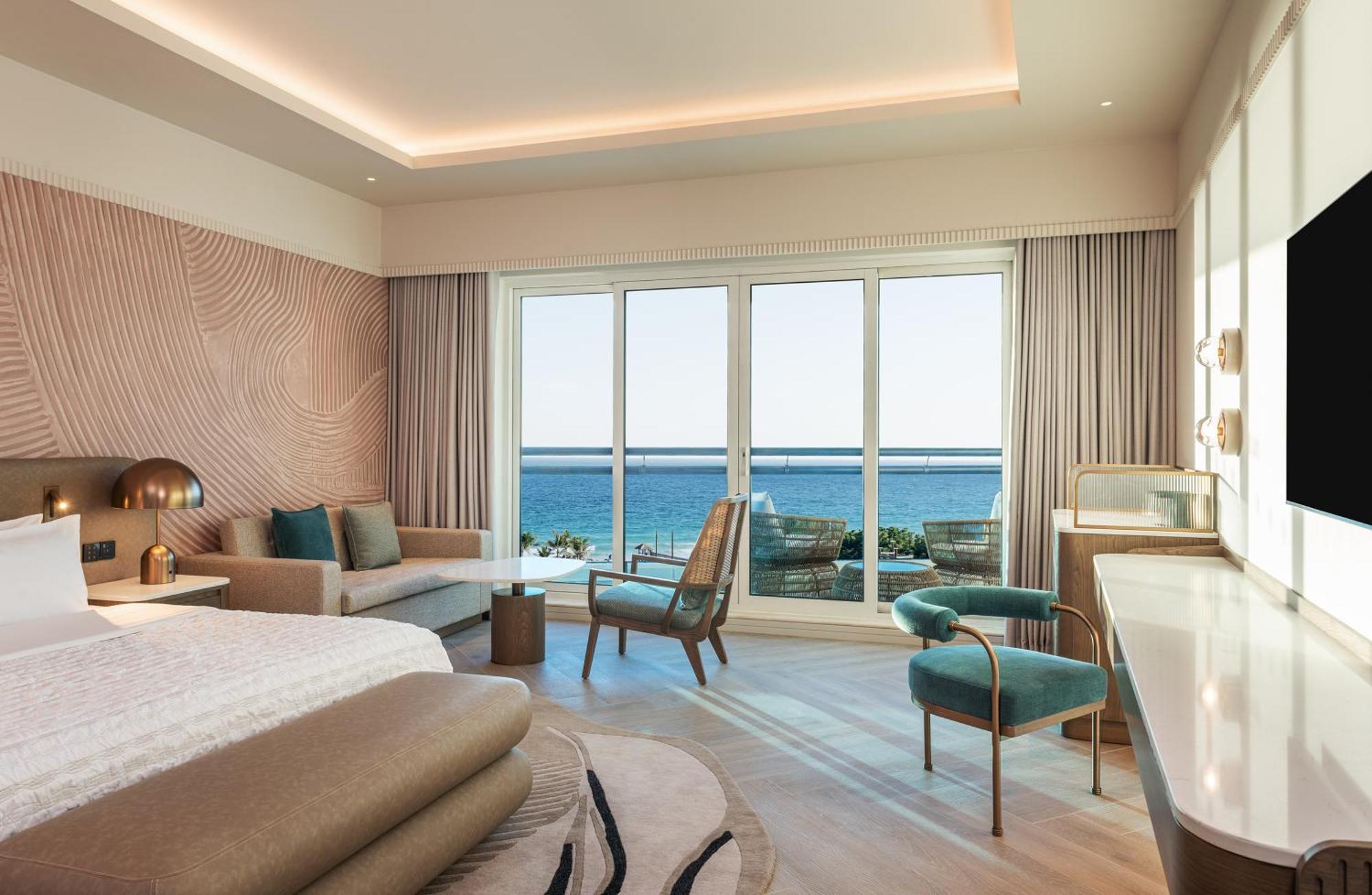 Le Meridien Al Aqah Beach Resort Extérieur photo Deluxe Seafront Room